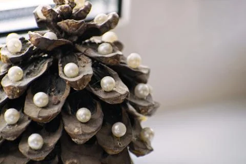 Pine cone in the form of a New Year tree. Christmas tree. Pine cone decorated Stock Photos