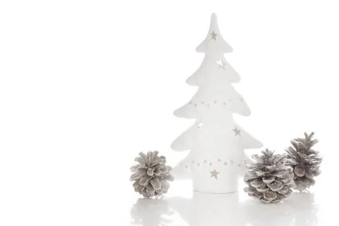 Pine cones isolated on a white background for christmas with a ceramic tree Stock Photos