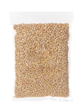 Pine nut kernel. Vacuum cleaned. Isolated. White background. Foto stock