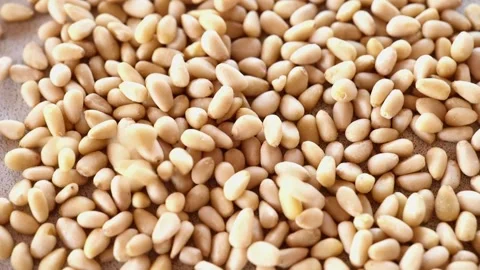 Pine nut kernels background.Healthy fats in the diet Stock Footage 319846348