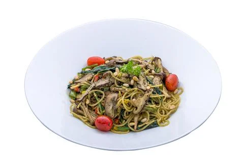 Pine Nuts Aglio Olio served in a dish isolated on plain white background side Stock Photos