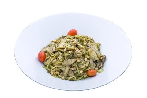 Pine Nuts Basil Pesto served in a dish isolated on plain white background sid Stock Photos