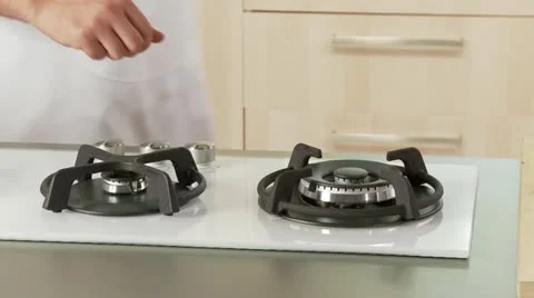 Pine nuts being added to a non-stick pan Stock Footage 24636973