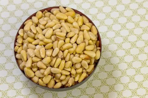 Pine nuts in a bowl Stock Photos