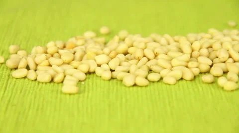 Pine nuts on a green napkin Stock Footage 49671255
