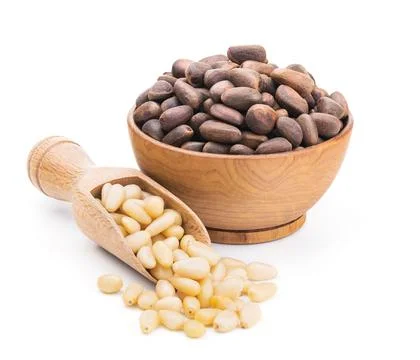 Pine nuts isolated on white Foto stock