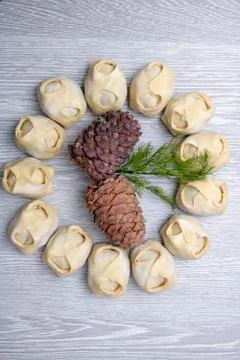Pine nuts with manti around, vertical photo. Top view Stock Photos