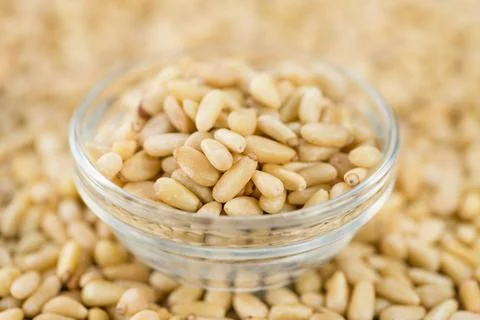  Pine Nuts (selective focus) Portion of fresh Pine Nuts (close-up shot; se... Foto stock