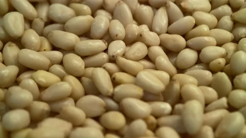 Pine nuts spinning around. Close up Stock Footage 141723049