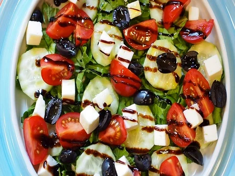 Pine nuts in vegetable salad Stock Footage 82000446