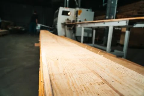 Pine sawn timber processed in a construction workshop. Concept of folded stacked Stock Photos