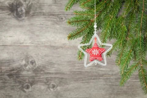 Pine tree and star on old wooden background Stock Photos