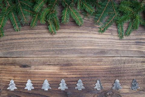 Pine tree with Christmas tree on old wooden background Stock Photos