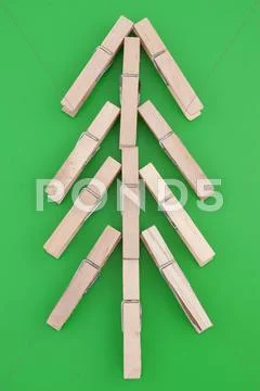 Pine tree made of wooden clothes pegs Stock Photos