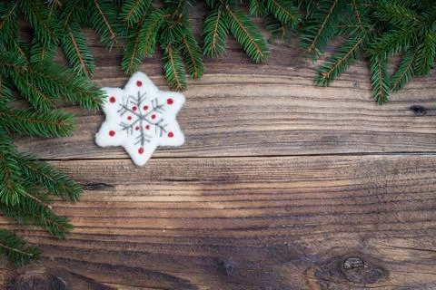 Pine tree with star on old wooden background Stock Photos