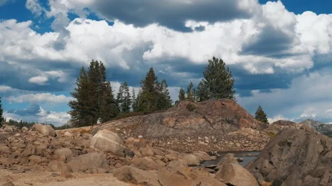 Pine trees grow on granite formations in a high alpine California landscape Stock-Footage 347832414