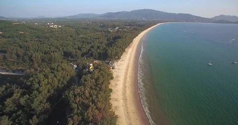 Pine Trees At The Top Of Layan And Bangtao Beach, Phuket, Thailand, Descending Stock Footage 79330883