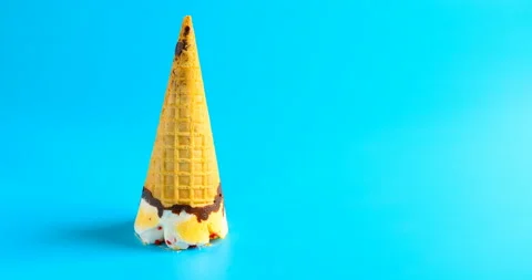 Pineapple and cherry flavor ice cream cone fell down and melted Stock Footage 130422644