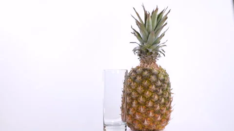 Pineapple and Empty Glass Rotating Video stock 130446157