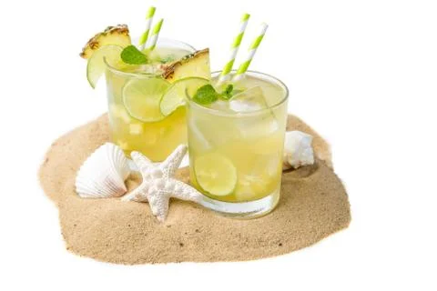 Pineapple and lime drink on rustic background Stock Photos