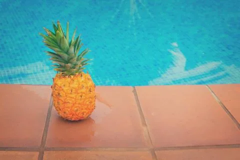 Pineapple and pool Stock Photos