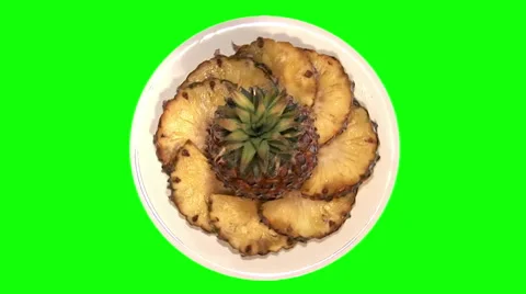 Pineapple and segments on plate, top shot Stock Footage 48125227