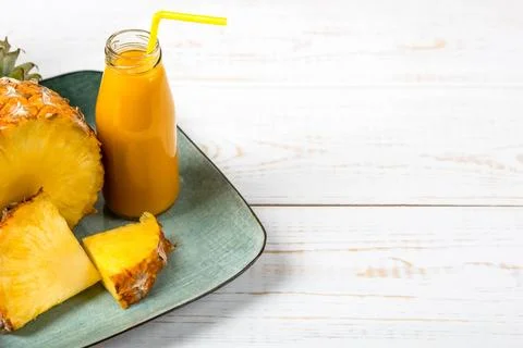 Pineapple and smoothie Stock Photos