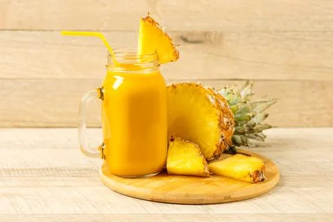 Pineapple and smoothie Stock Photos