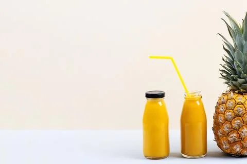 Pineapple and smoothie Stock Photos