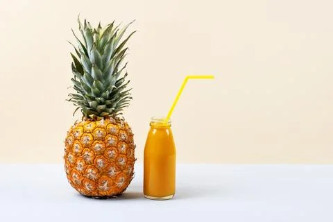 Pineapple and smoothie Stock Photos