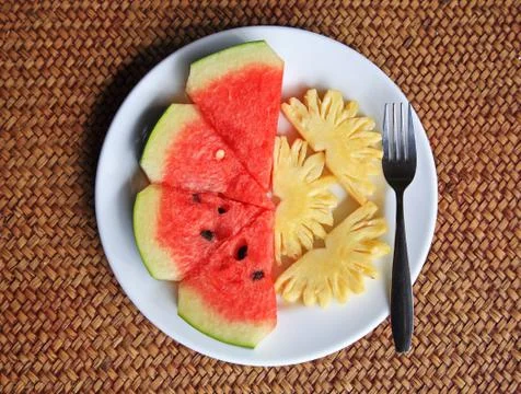 Pineapple and watermelon Stock Photos