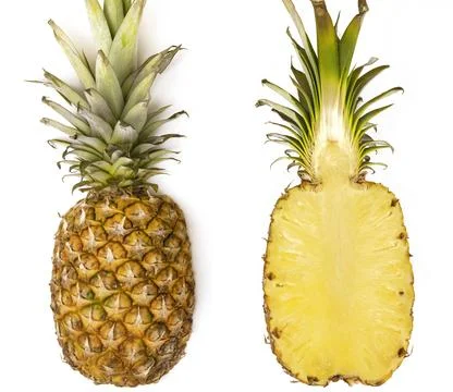 Pineapple background. Top view of pineapple halves. 库存照片