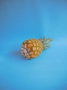 Pineapple on Blue Background Stock Photos