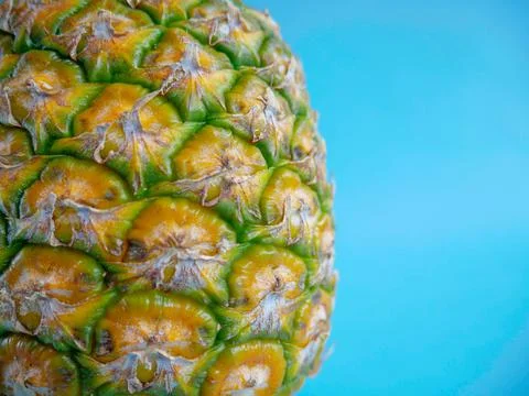 Pineapple on Blue Background Stock Photos