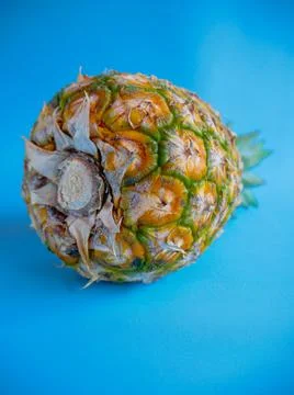 Pineapple on Blue Background Stock Photos