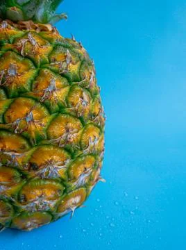 Pineapple on Blue Background Stock Photos