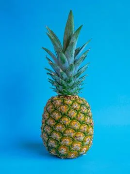 Pineapple on Blue Background Stock Photos