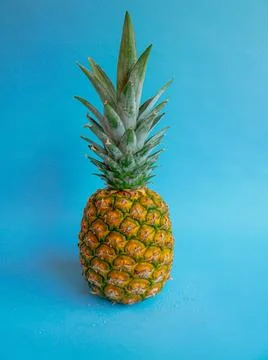 Pineapple on Blue Background Stock Photos