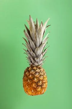 Pineapple on bright background creative layout, copy space. Flat lay. Food co Stock Photos