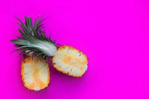 Pineapple on bright pink background Stock Photos