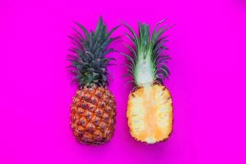 Pineapple on bright pink background Stock Photos
