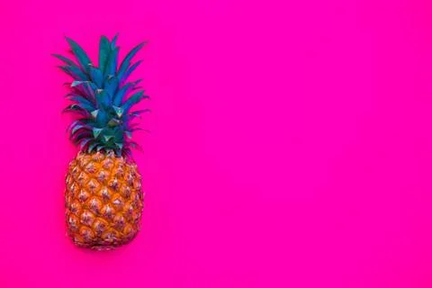 Pineapple on bright pink background Stock Photos