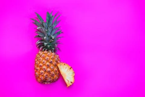 Pineapple on bright pink background Stock Photos