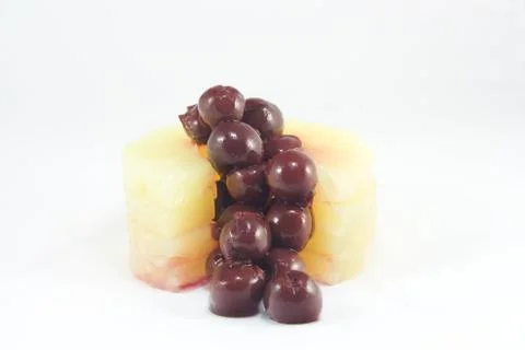 Pineapple with cherry Stock Photos