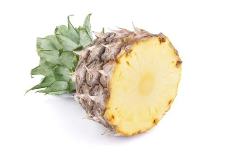 Pineapple cut in half isolated on a white background Stock Photos