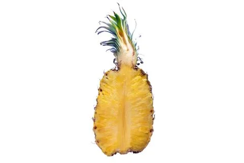 A pineapple cut in half isolated on white background. The (Ananas comosus) is a Stock Photos