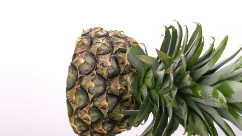 Pineapple cut in half lying on the table. Stock Footage 220819536