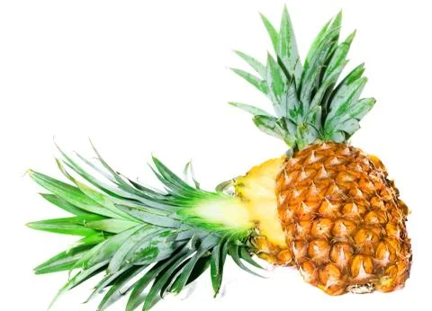 Pineapple cut in half on a white background isolated Stock Photos