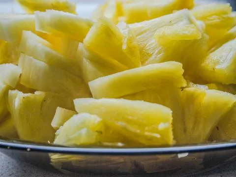 Pineapple cut into pieces Fotos Stock