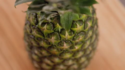 Pineapple Detail Tilt Down Rack Focus Looking Down Side Video stock 155116180